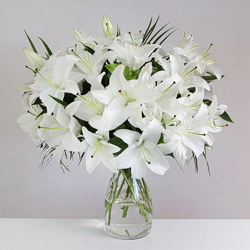 Elegant White Lilies In Vase