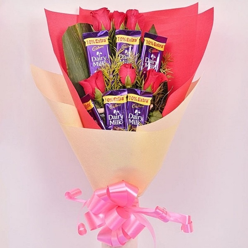 Roses With Dairy Milk New Year Gifts