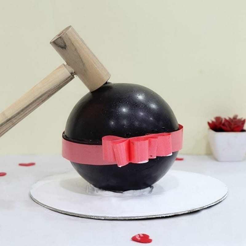 Black Ball Pinata Cake